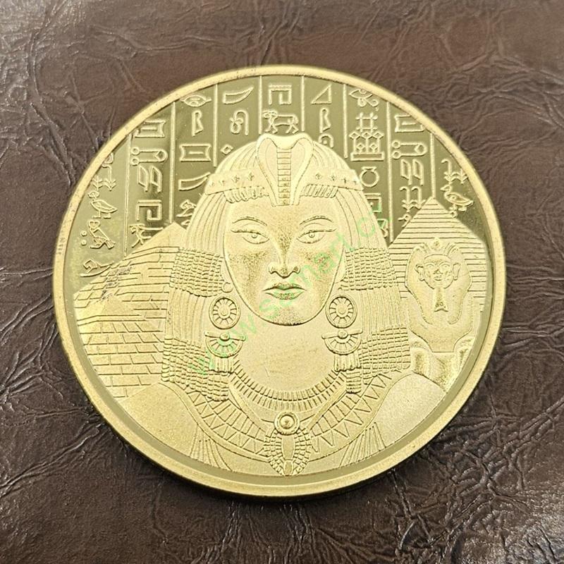 Egyptská mince s Kleopatrou