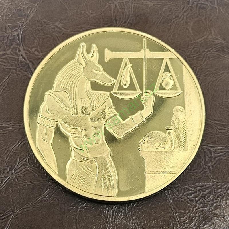 Egyptská mince s Anubisem