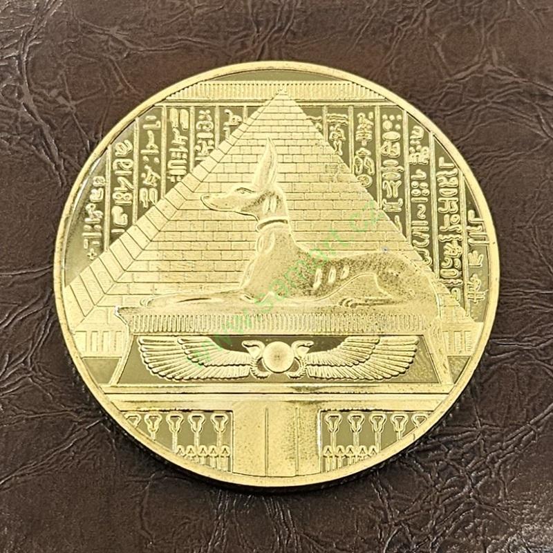 Egyptská mince s Anubisem