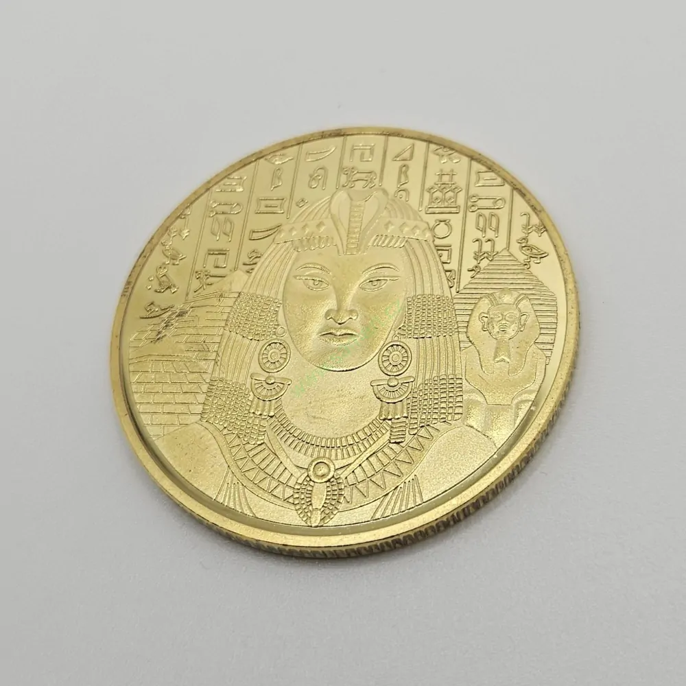 Egyptská mince s Kleopatrou