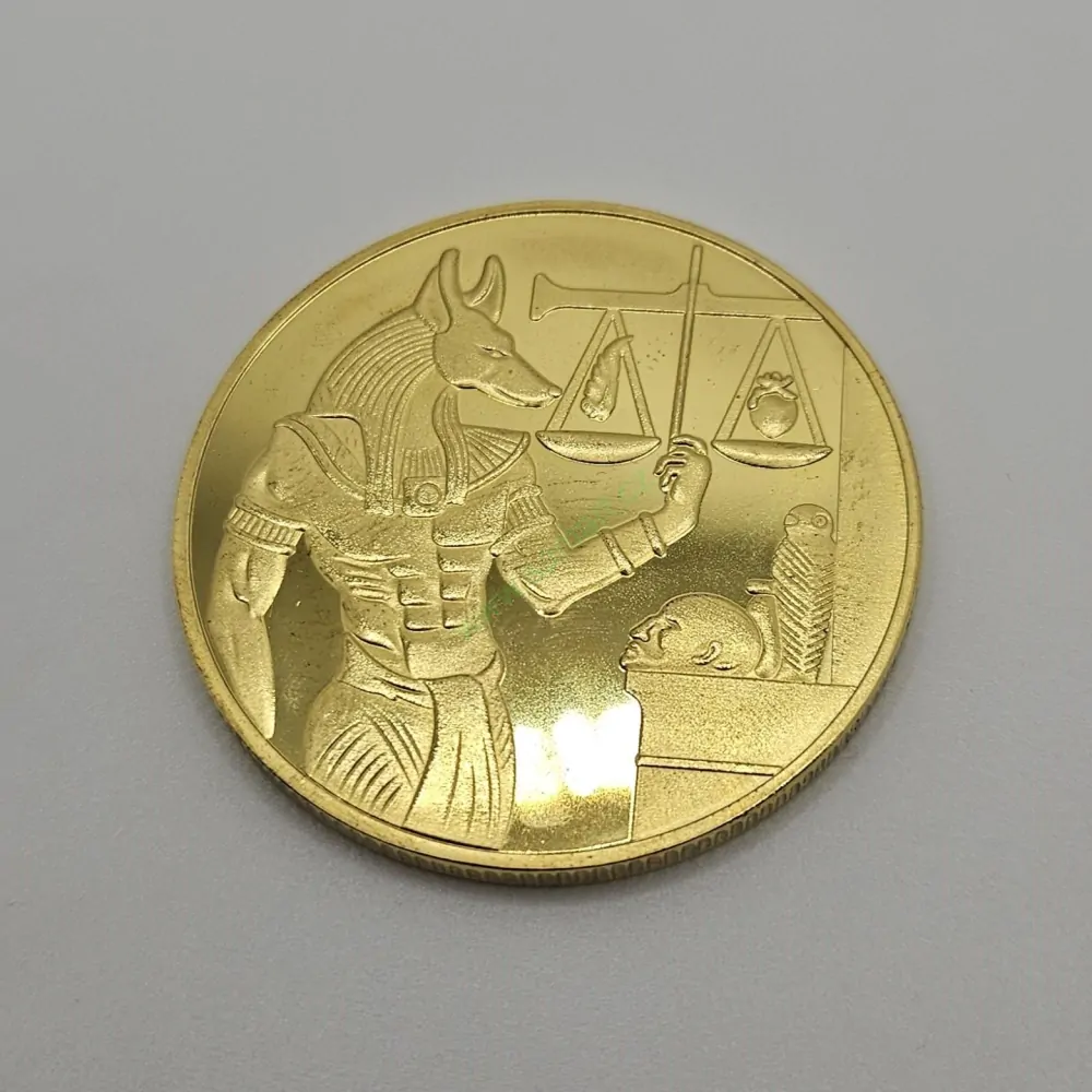 Egyptská mince s Anubisem