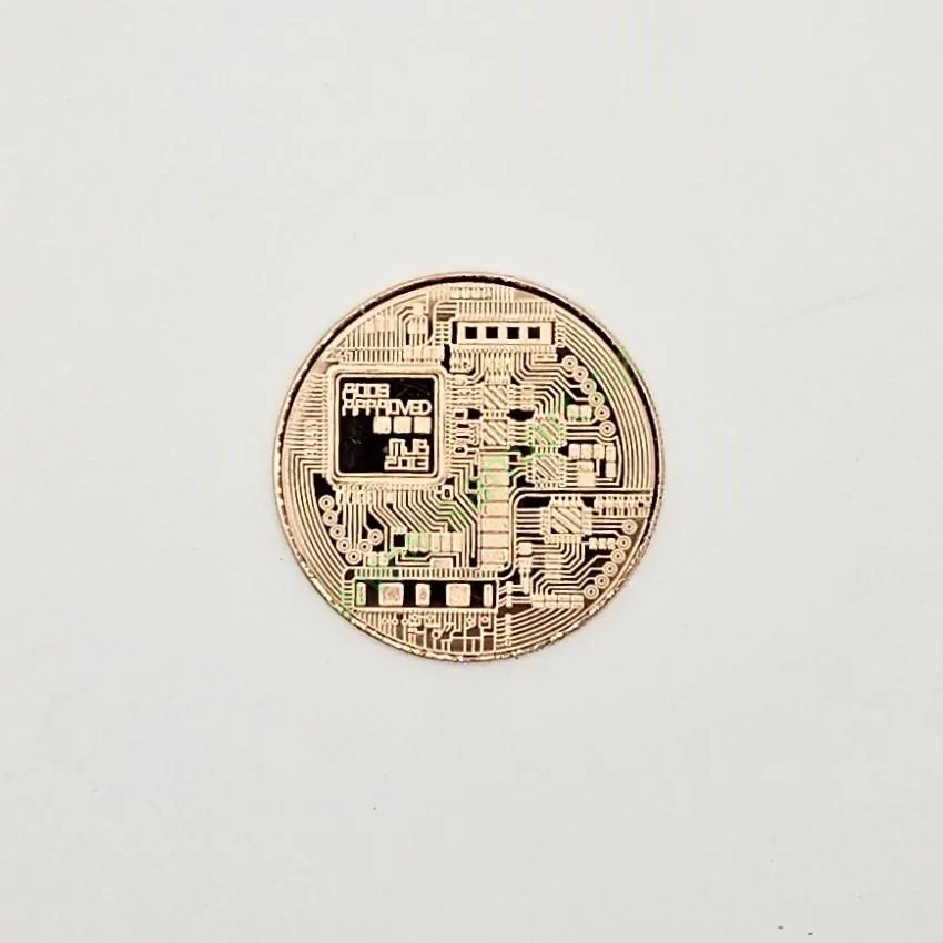 Měděná mince Bitcoin