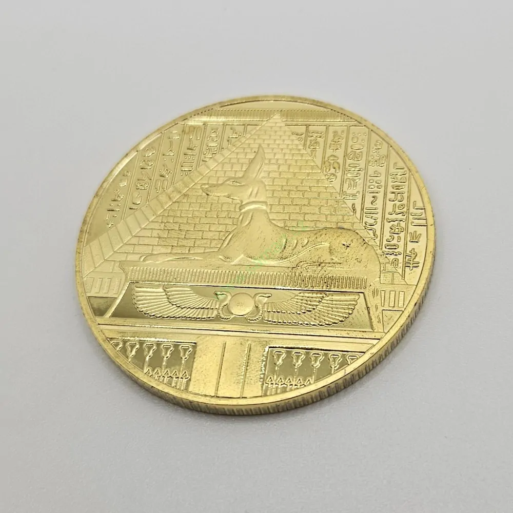 Egyptská mince s Anubisem